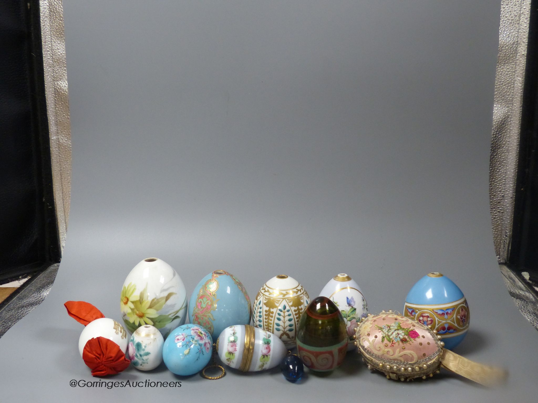 Assorted 19th/20th century Russian painted and gilded porcelain Easter eggs